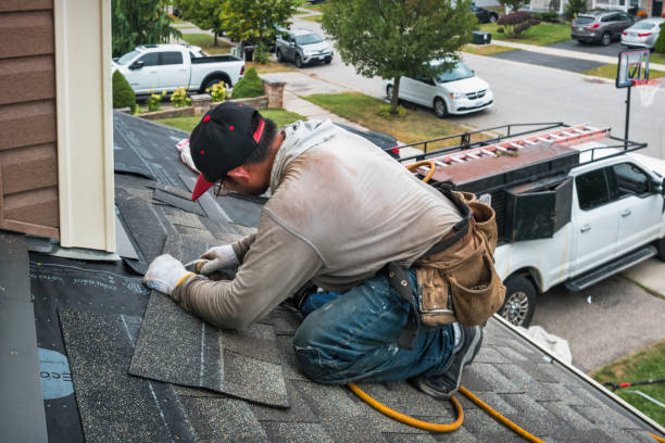Professional Roof Installation technician working in Mastic, NY